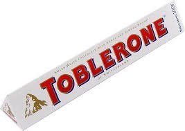 Білий шоколад Toblerone з горіхом 100г НФ-00009469 фото